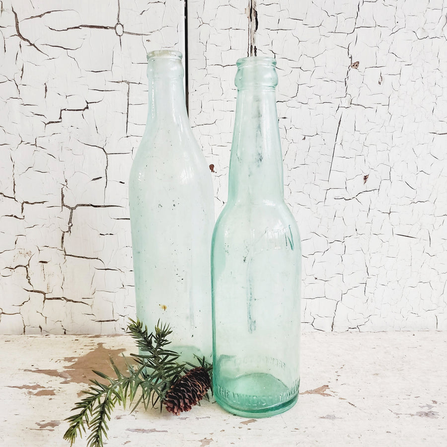 Pair of  Vintage Aqua Blue Glass Bottles